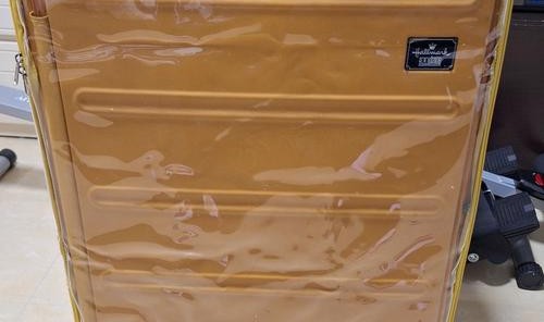 拉杆箱上的包,行李拉杆箱不需包裹包装带因为已通过压力测试