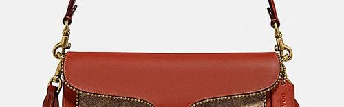 蒄弛包包中国官网,蔻驰销往全球名牌包包排行榜前列