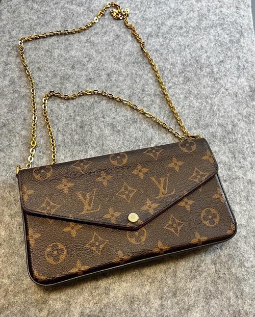 买真皮包包进哪个网站,网购布童之谜包链条坏了店家:可以换