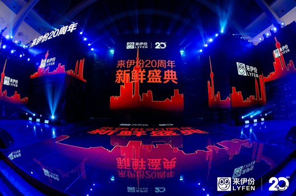 A lit up city at nightDescription automatically generated