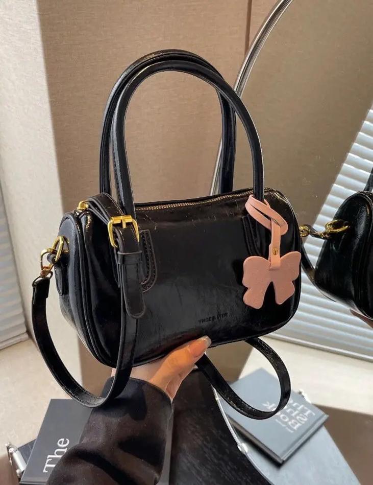 st女包是什么牌子,小众品牌吉时哲包包知名度还可以